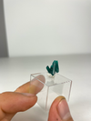 dioptase for jewelry - against a finger